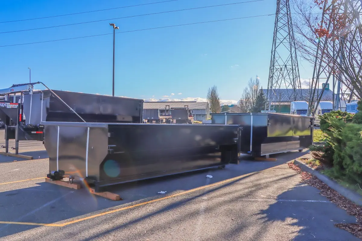 Roll-off dumpster ready for waste disposal at job site for 2 Yard Dumpster Rental in Suffern